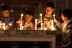 Children lighting candles in church