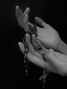 Hands holding rosary