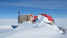 Station covered by drifting snow