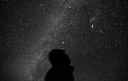person looking at sky at night